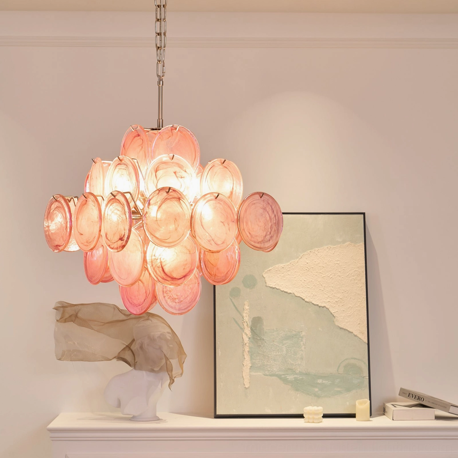 Ellie pink Murano disc chandelier showing ethereal light diffusion and soft translucent glass aesthetic