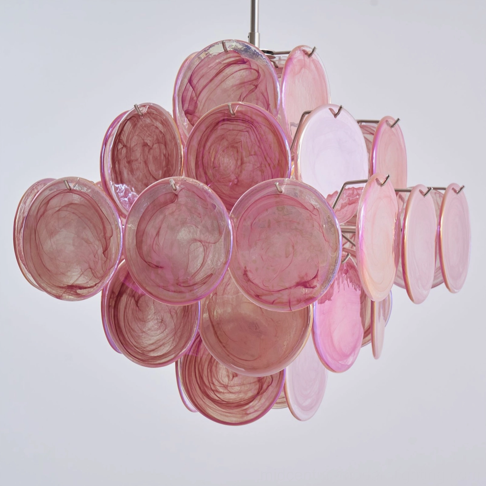 Side front view of pink disc glass chandelier showing light-dark marbled Murano glass with exposed metal mounting frame