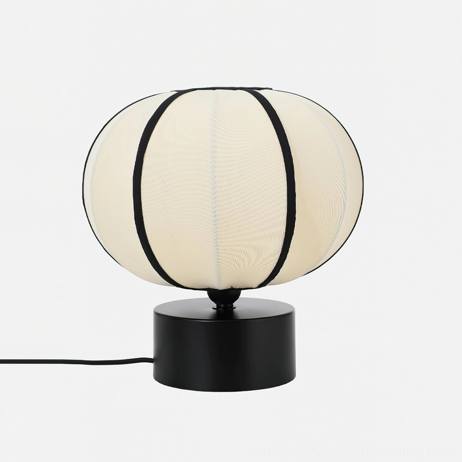 Ellos mid-century table lamp side view showing matte black metal base and cord