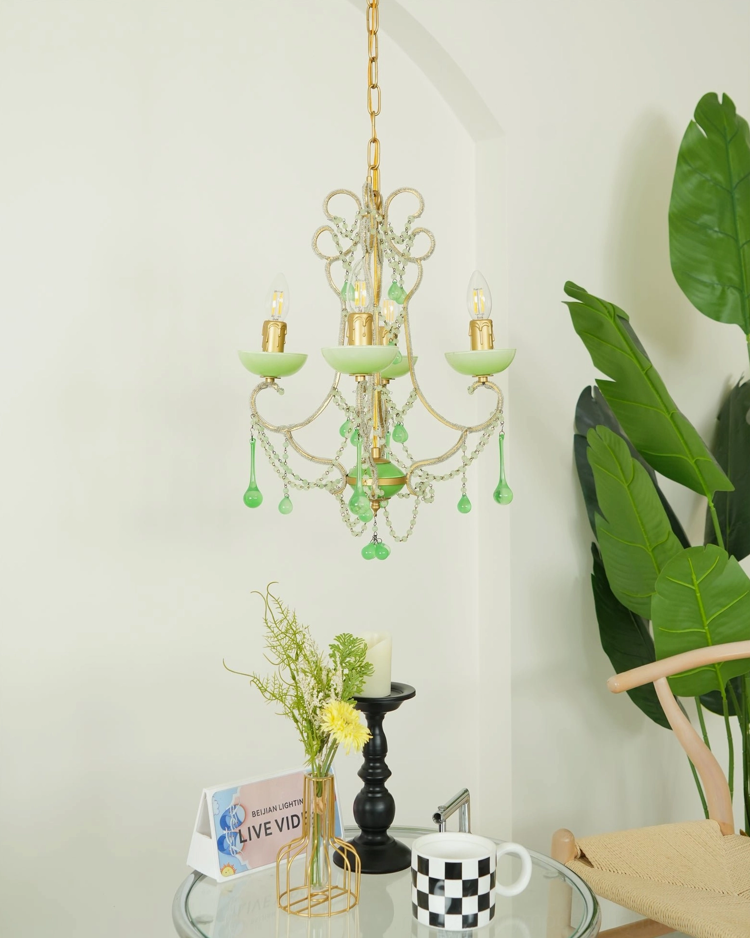 Complete four-light emerald green Murano chandelier with decorative glass drops and gold metal frame assembly