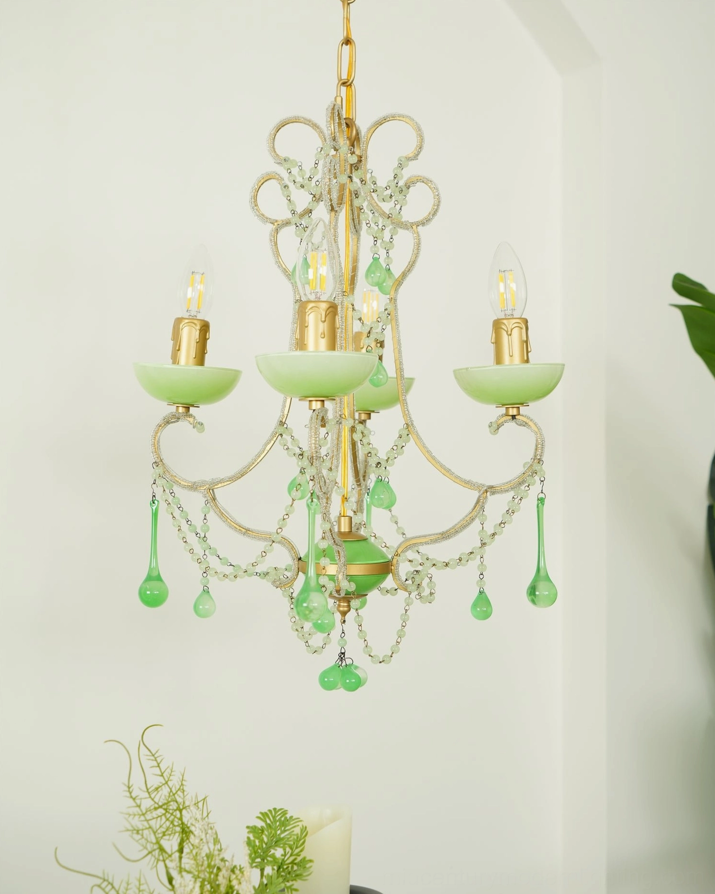 Emerald green Murano glass chandelier in mid-century modern style with elegant hanging glass elements