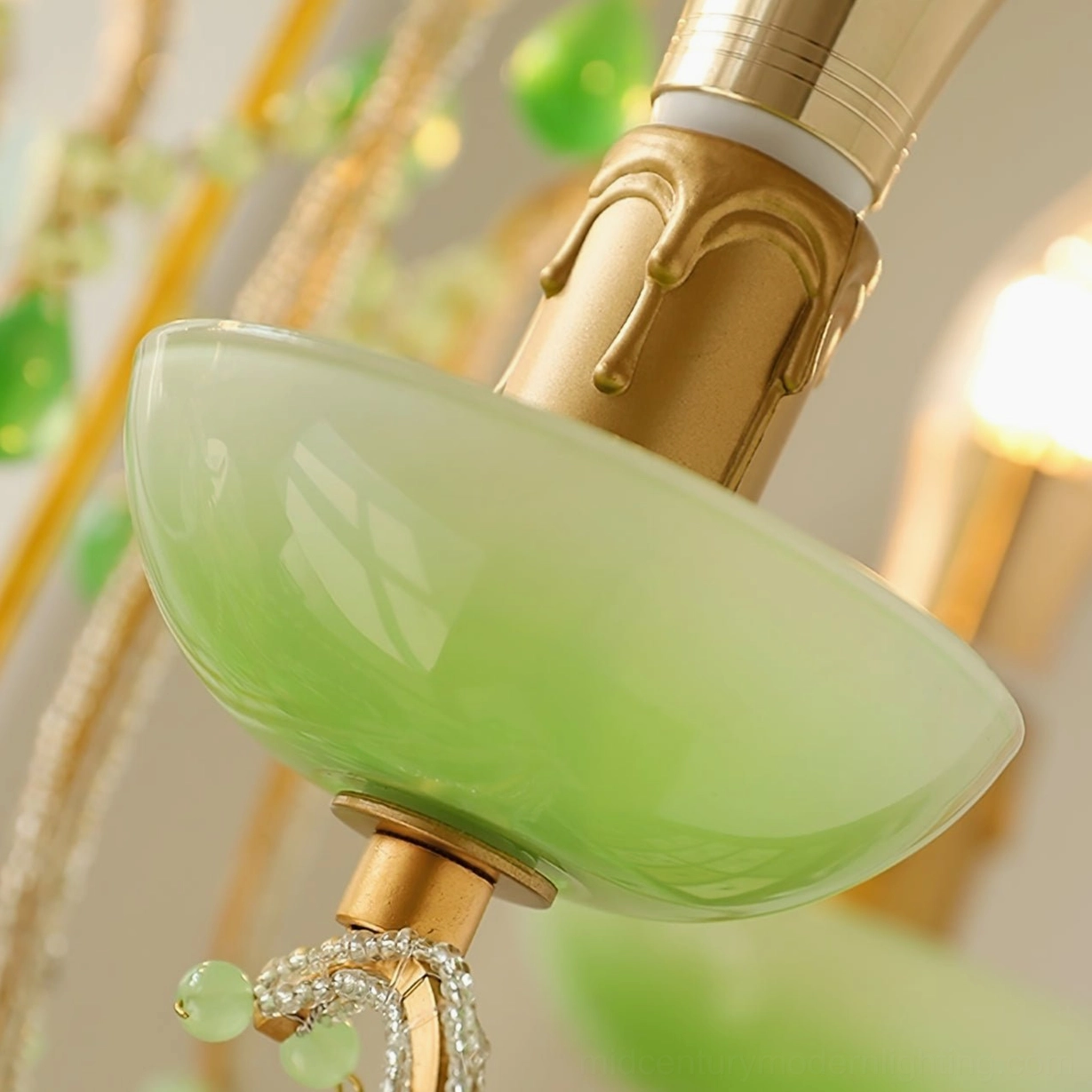 Four-light emerald Murano chandelier with suspended green glass pendants and gold metalwork