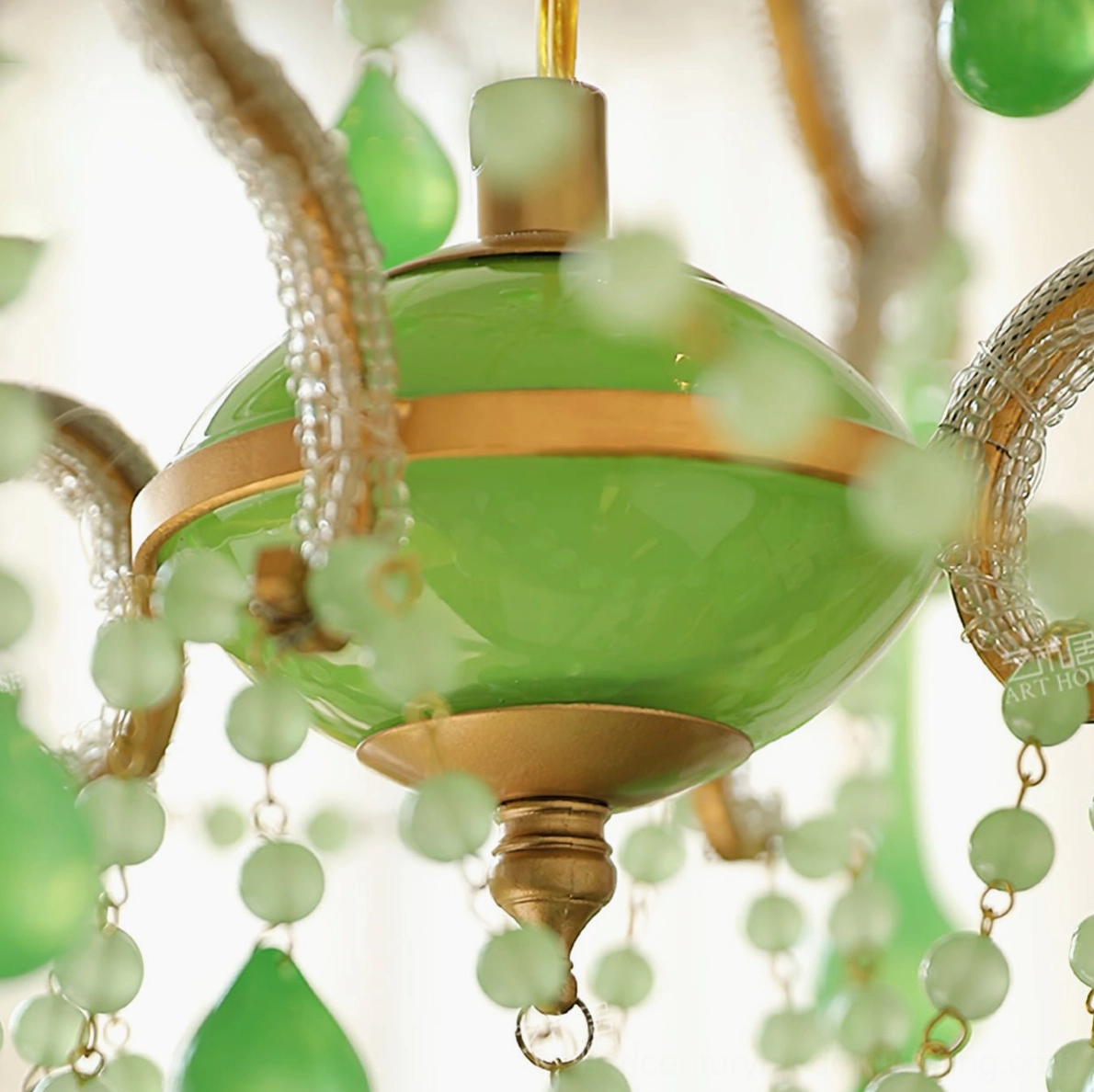 Vintage-style emerald green Murano glass chandelier with ornamental metal scrollwork and glass drops