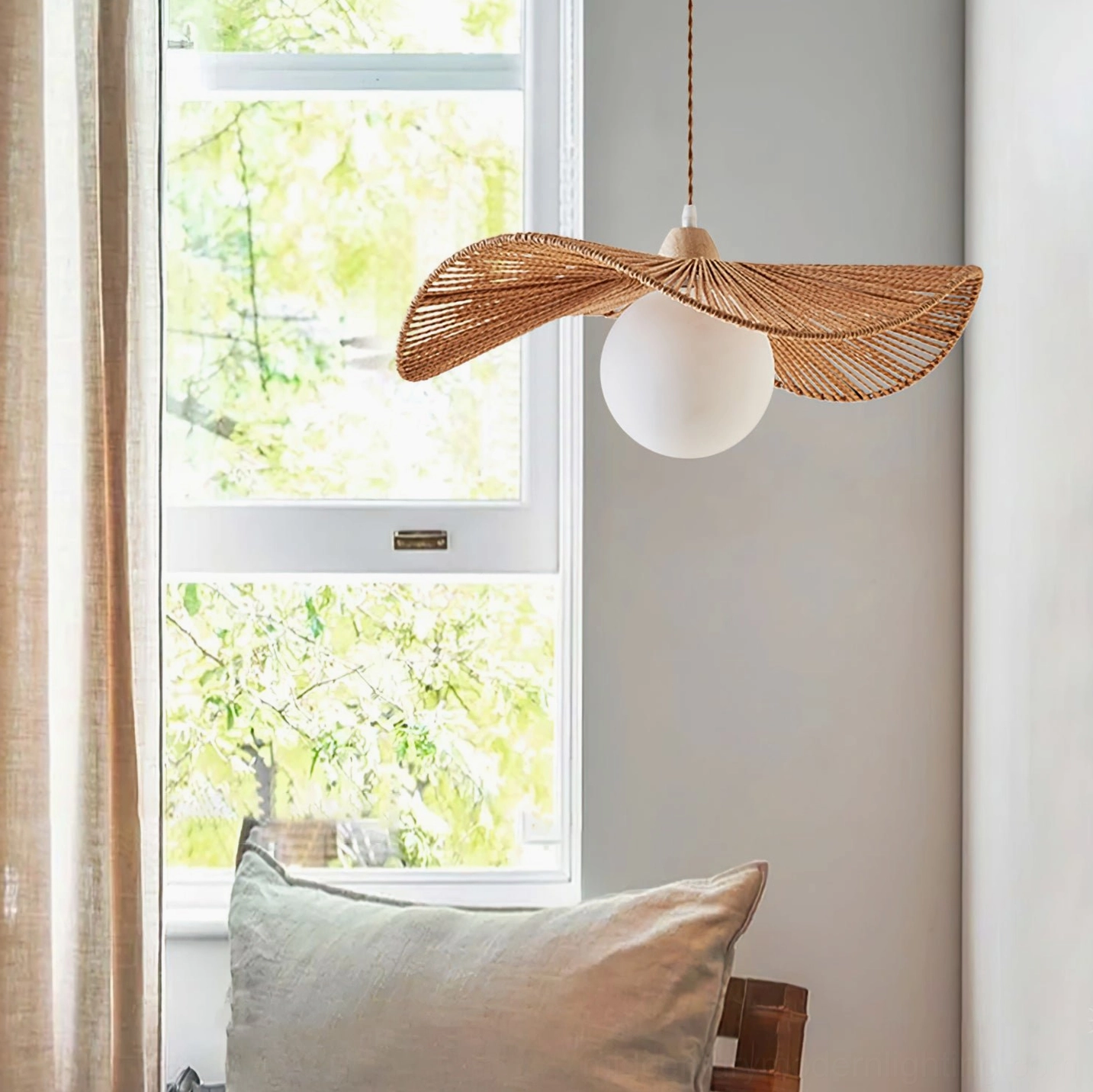 Emmi rope pendant lamp suspended near residential window with linen curtains in cozy home setting