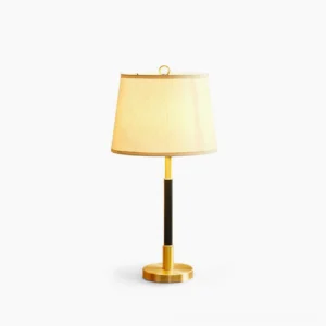 Empire Brass Table Lamp with beige fabric shade and black brass metal body, frontal studio view