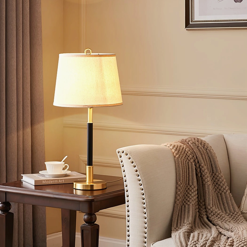 Empire Brass Table Lamp on living room side table with sofa decor and brass-black finish detail