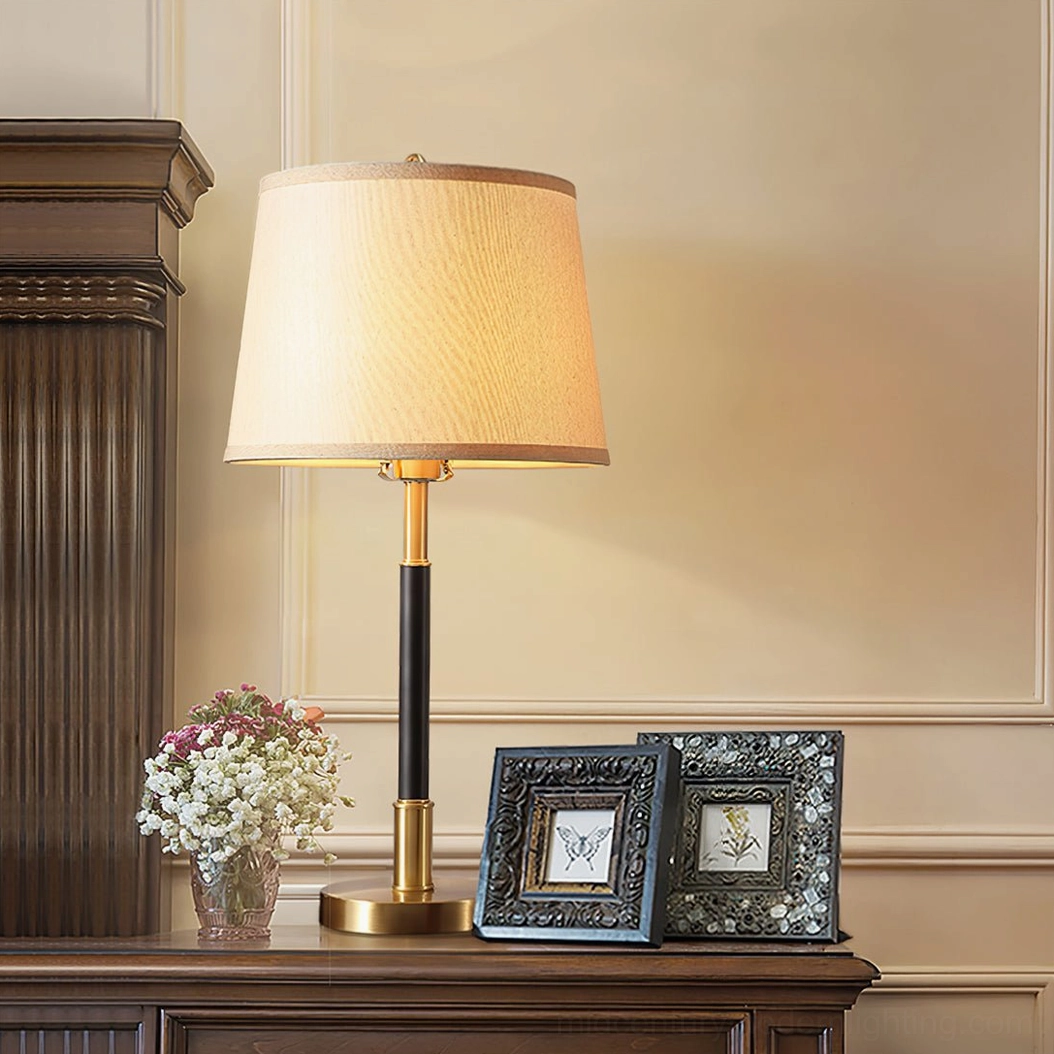 Empire Table Lamp warm light diffusion through beige fabric shade for home ambiance