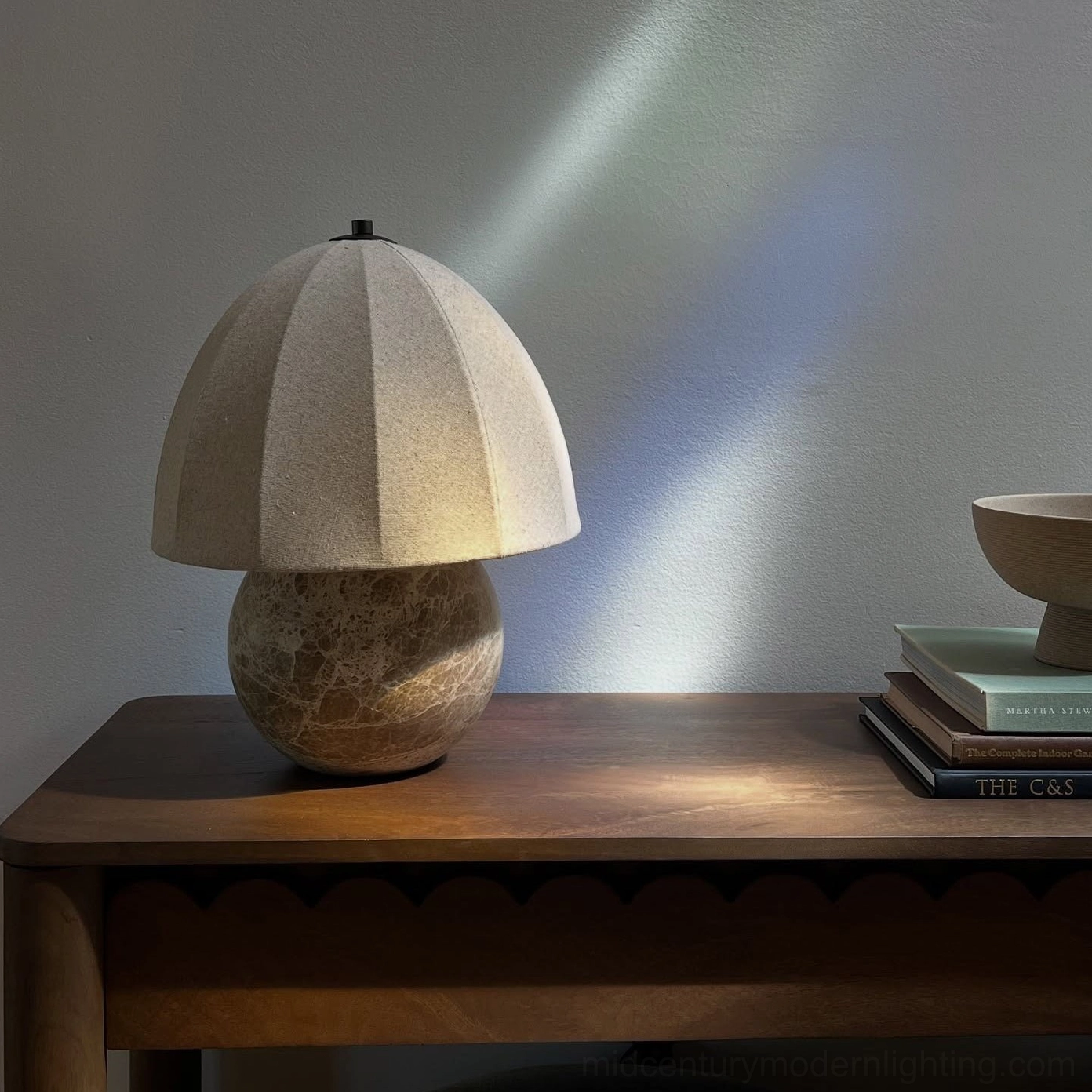 Enora natural marble table lamp detail shot showcasing unique stone veining and pleated fabric shade