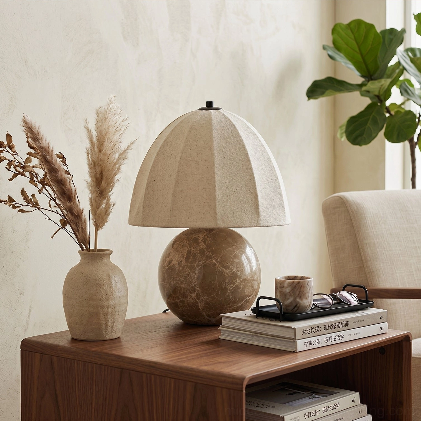 Enora mid-century modern table lamp on walnut nightstand with pampas grass and books, side angle view