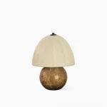 Enora organic modern table lamp with spherical natural marble base and pleated beige linen shade, studio frontal view