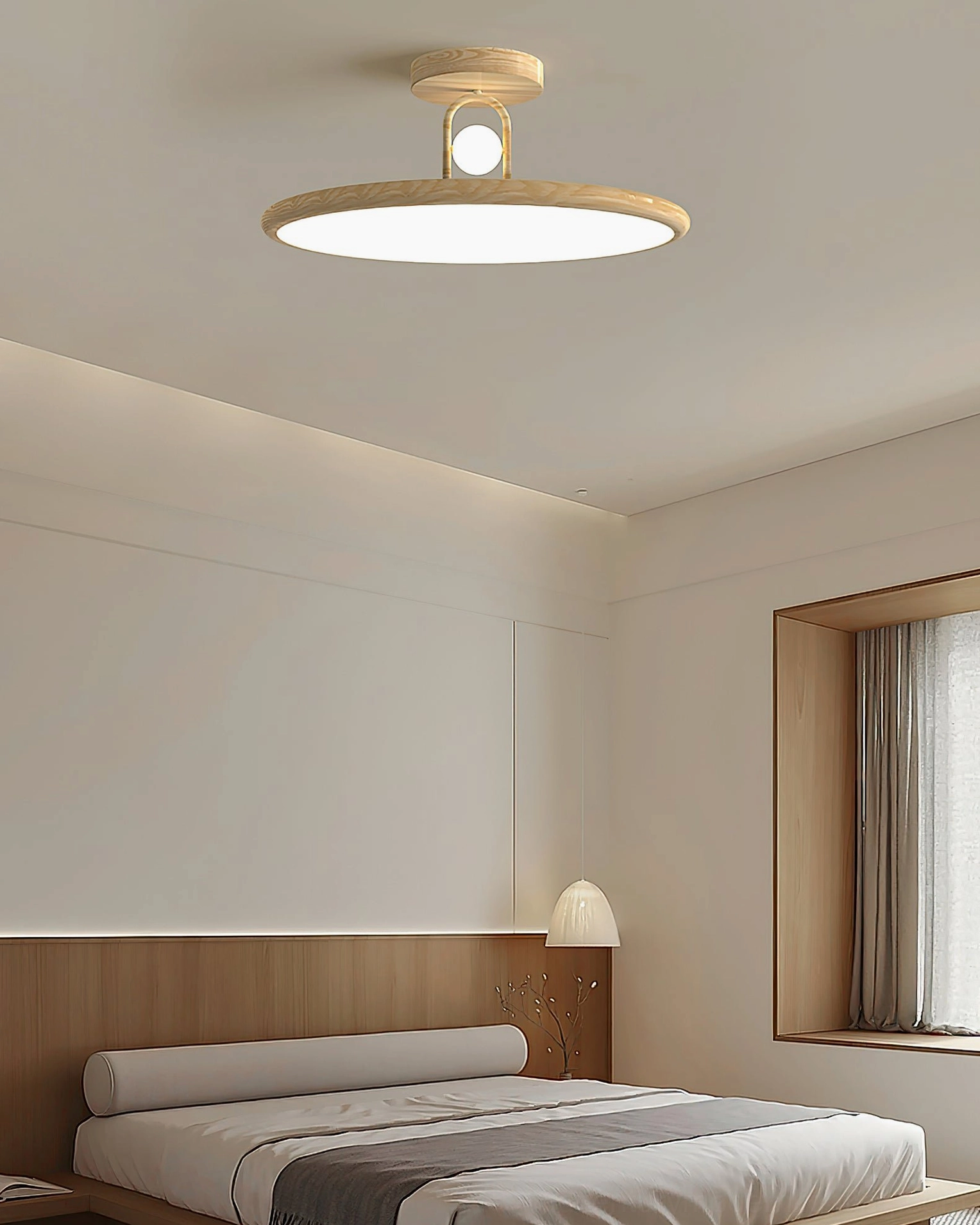 Minimalist bedroom space with light wood grain Envostar flush mount ceiling light creating creamy ambient glow