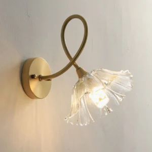 Ercole wall sconce mounted on textured wall with warm ambient light illuminating fluted glass petals