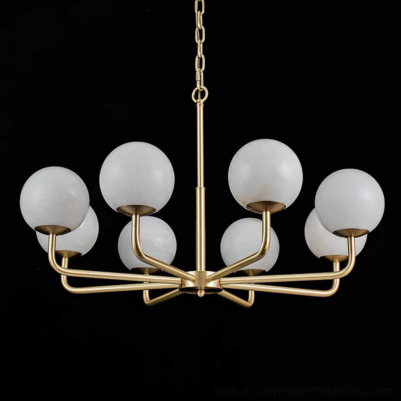 Artistic overhead view of Erich brass chandelier showing radial arm pattern and frosted glass globe arrangement