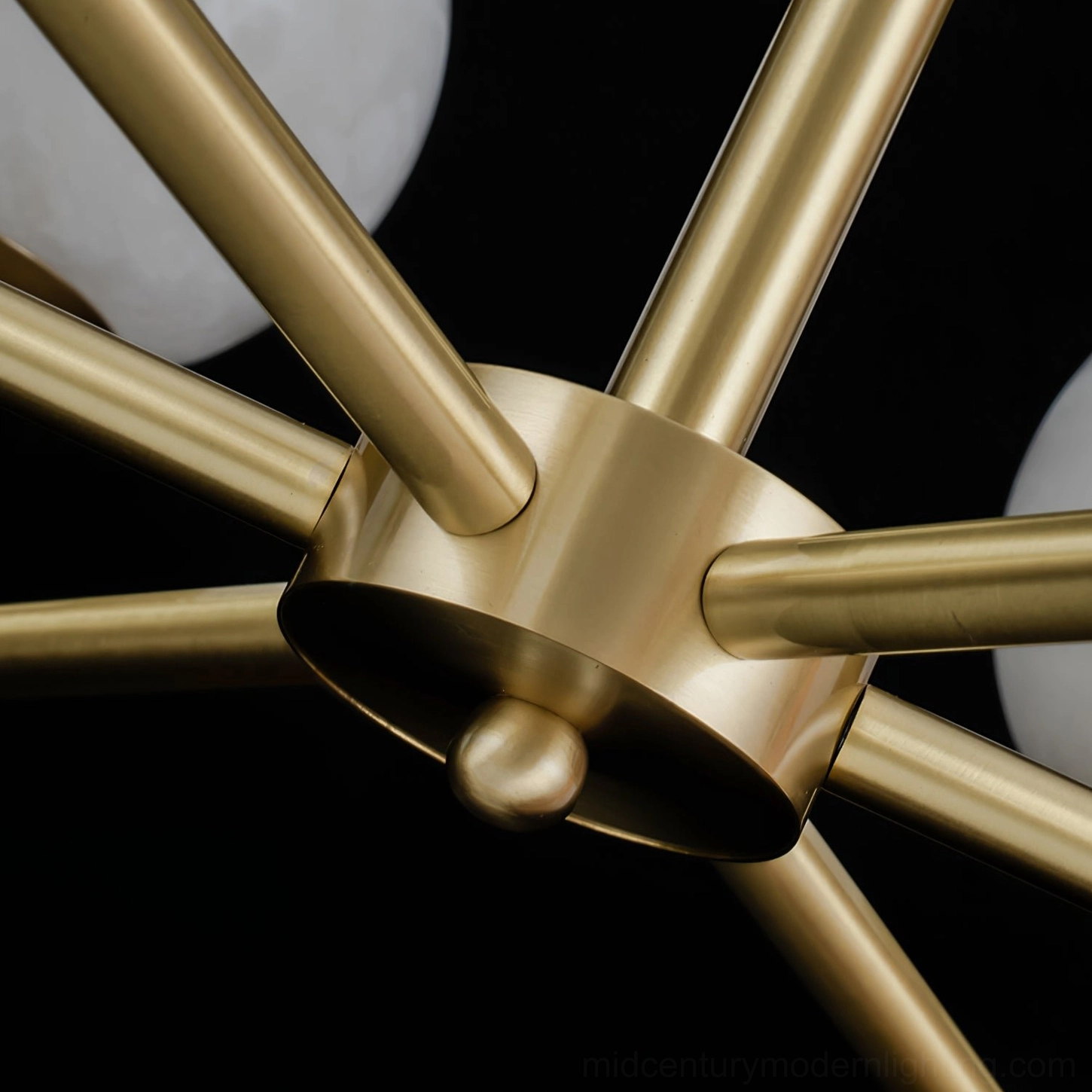 Erich chandelier side profile showing elegant curved arm silhouette and spherical shade proportions