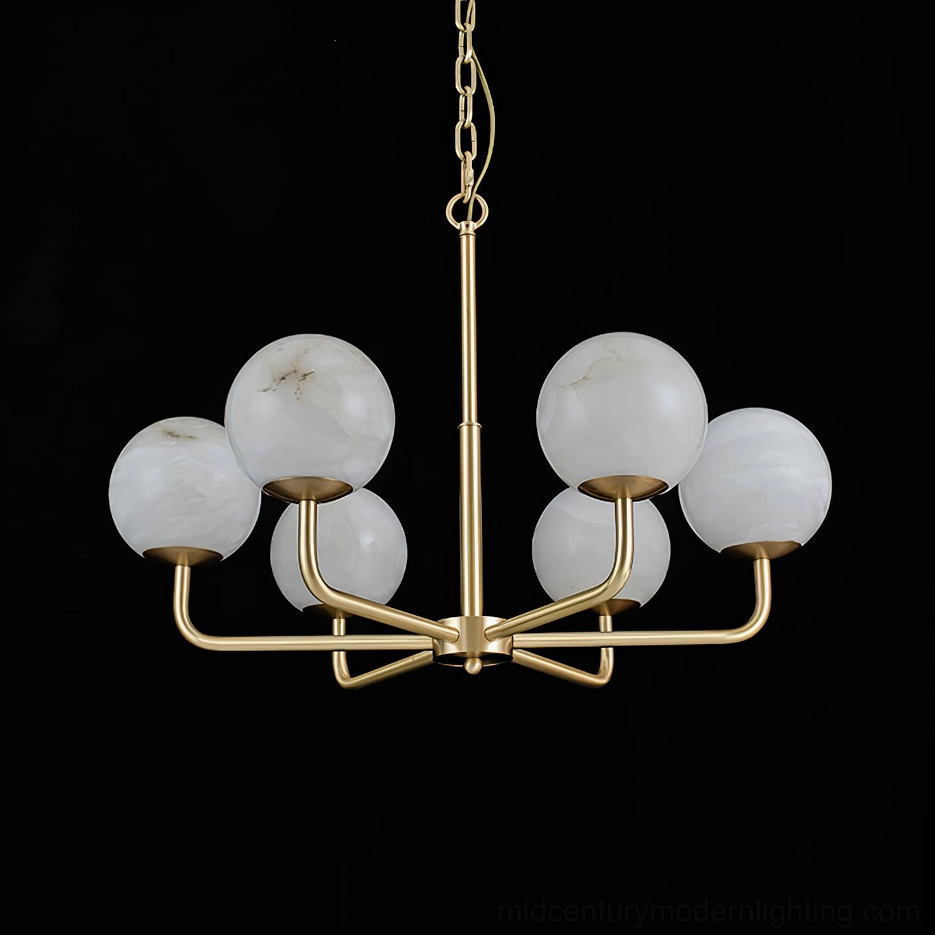 Erich brass and alabaster chandelier demonstrating soft diffused light quality through frosted glass shades
