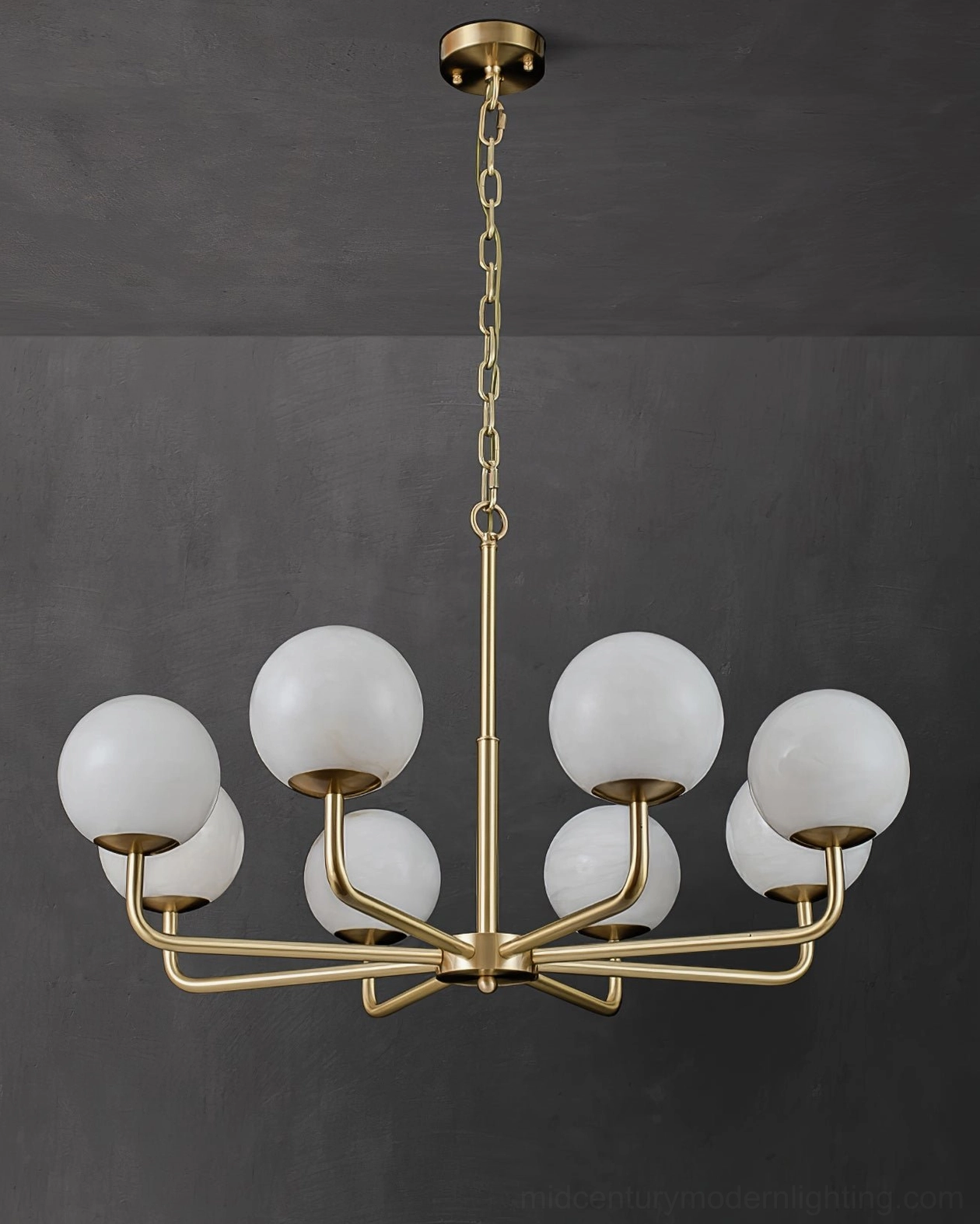Erich brass and alabaster globe chandelier demonstrating versatile design compatibility with modern interiors