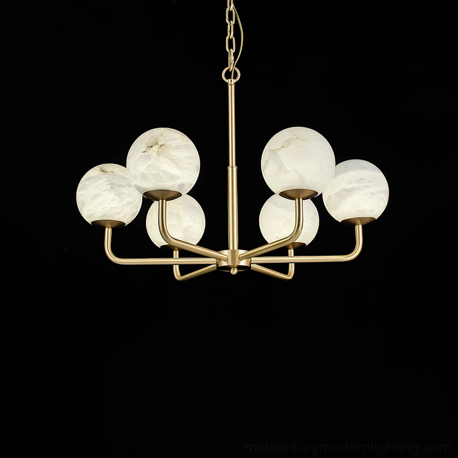 Erich six head chandelier detail shot showing individual alabaster globe and brass arm connection points
