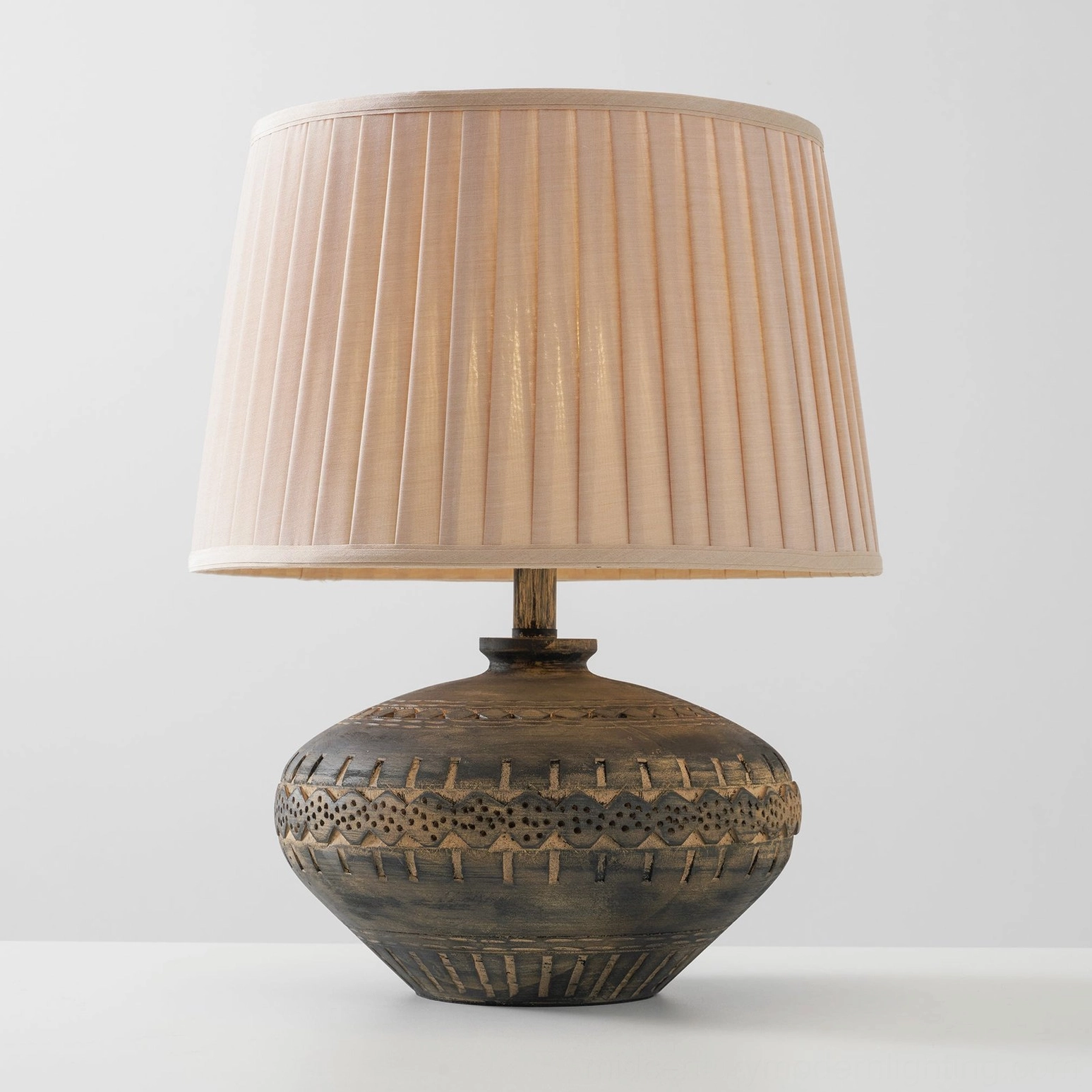 Etta lamp ceramic base with embossed geometric pattern and weathered finish showcasing artisan detail work