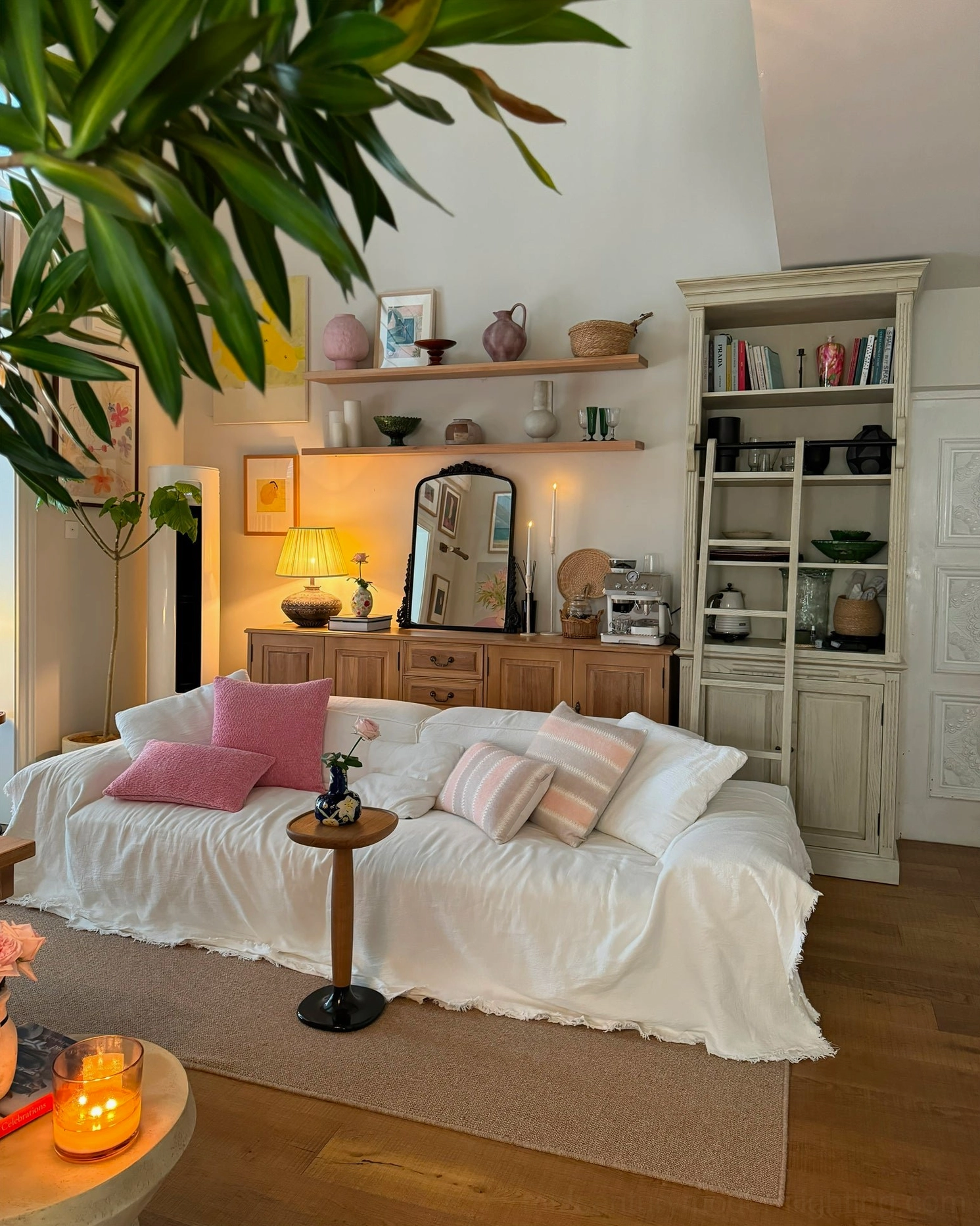 Etta ceramic table lamp on cozy living room daybed lounge displaying warm bohemian vintage interior styling