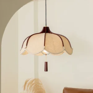 Evelyn pendant lamp installed in archway with walnut frame and beige fabric, three-quarter view showing warm vintage aesthetic
