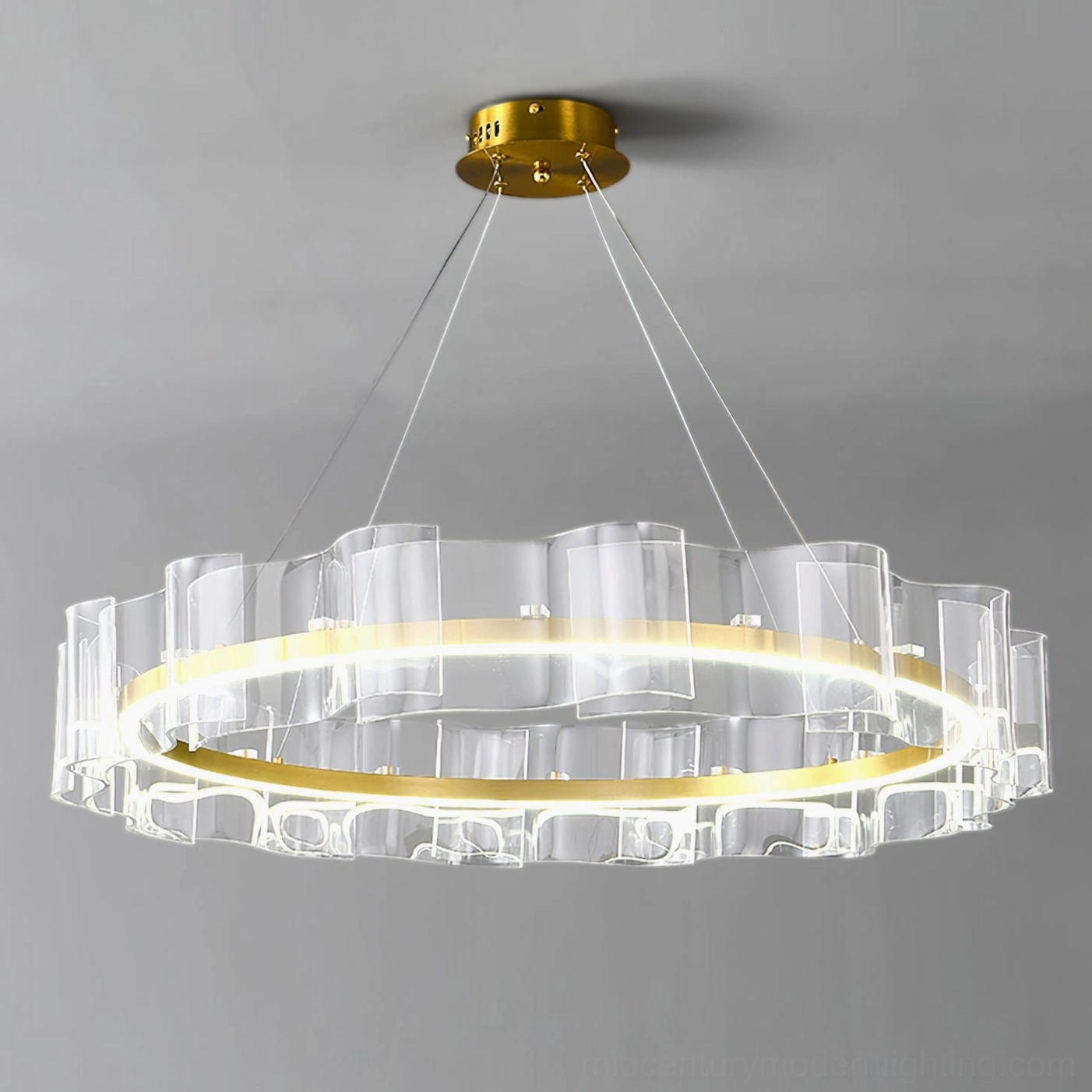 Close-up detail of layered transparent acrylic ripple panels on Evette LED pendant