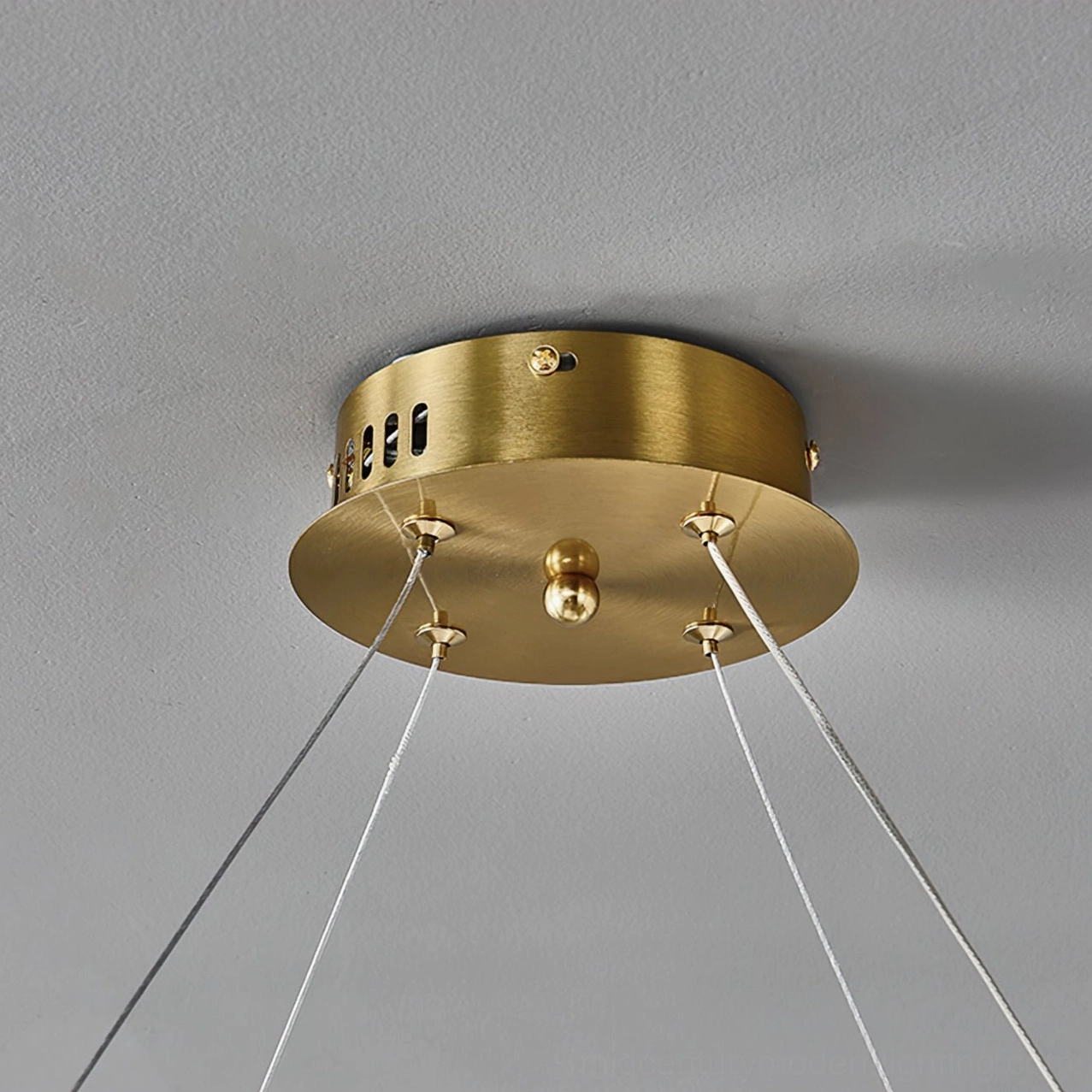 Ceiling mount base and hanging wire assembly for Evette Wave Chandelier with brass finish