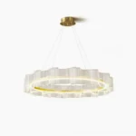 Evette Wave Acrylic LED Chandelier front view with gold brass hardware on white background