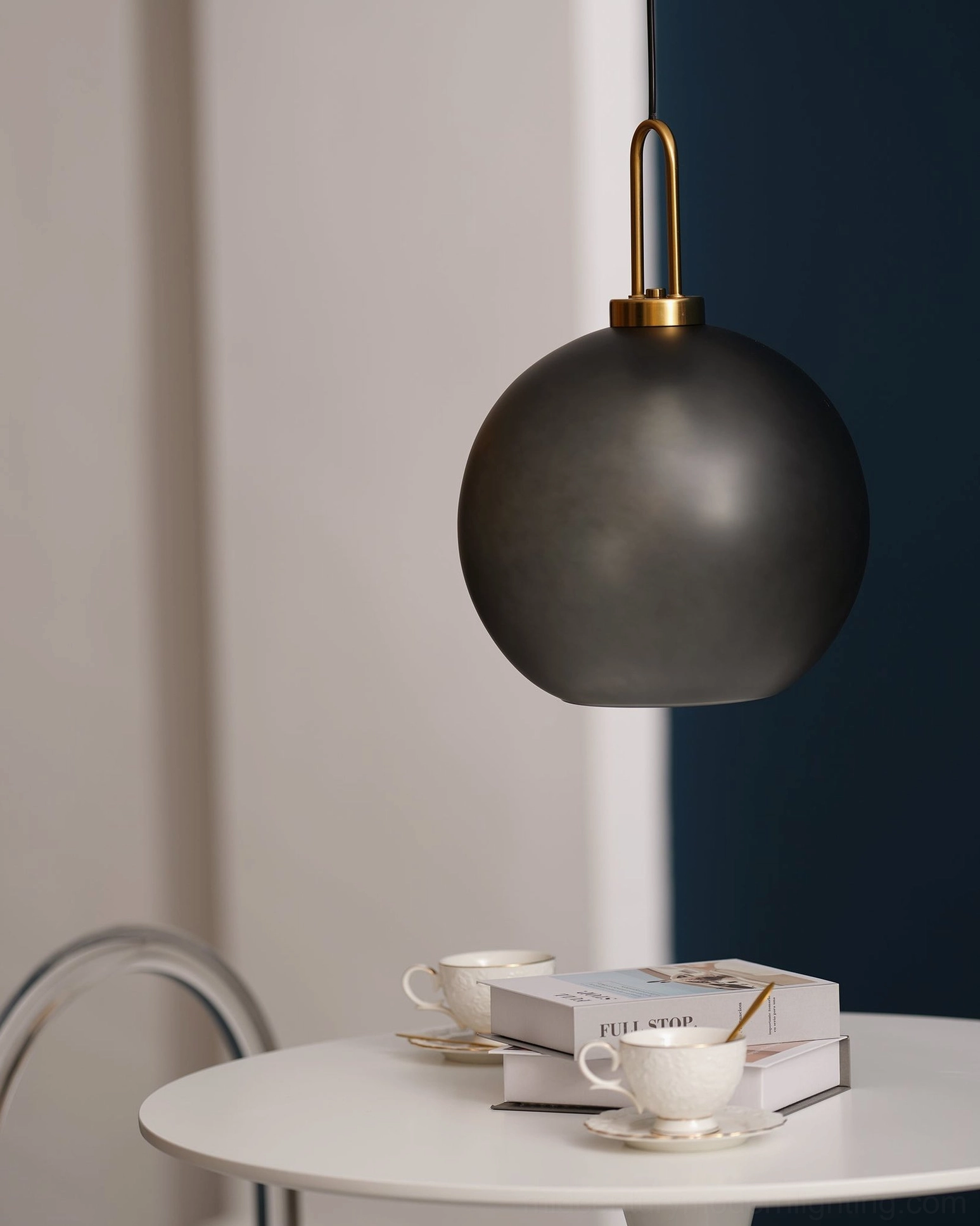 Extra large spherical smoked glass pendant lamp in contemporary high-ceiling interior space