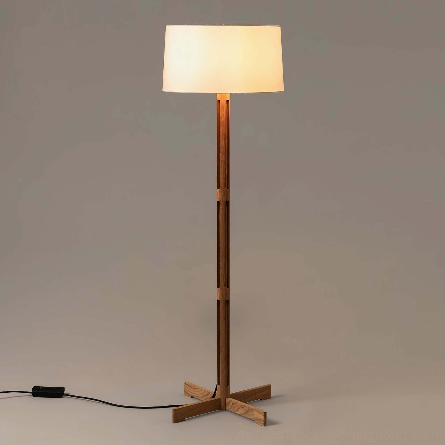 FAD Mid-Century Floor Lamp three-quarter angle showcasing cylindrical walnut pole and tapered shade design