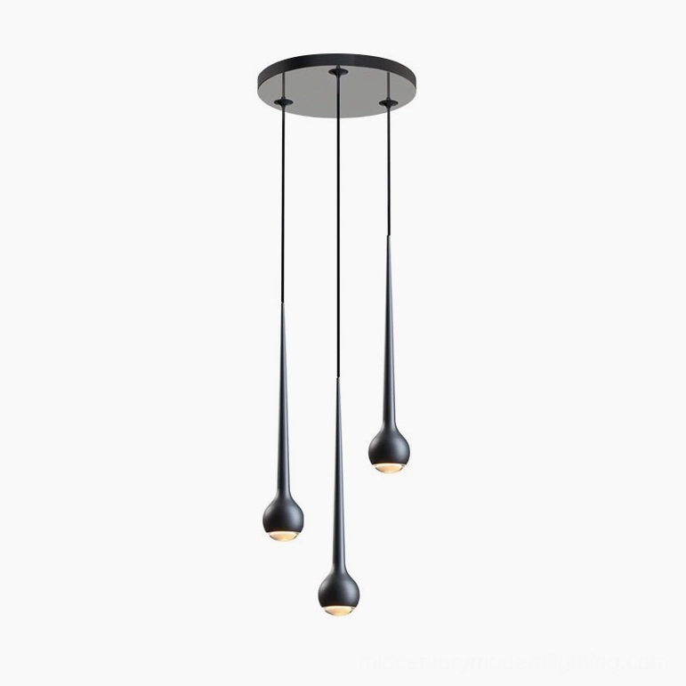 Black three-head pendant light system for open-plan contemporary commercial office