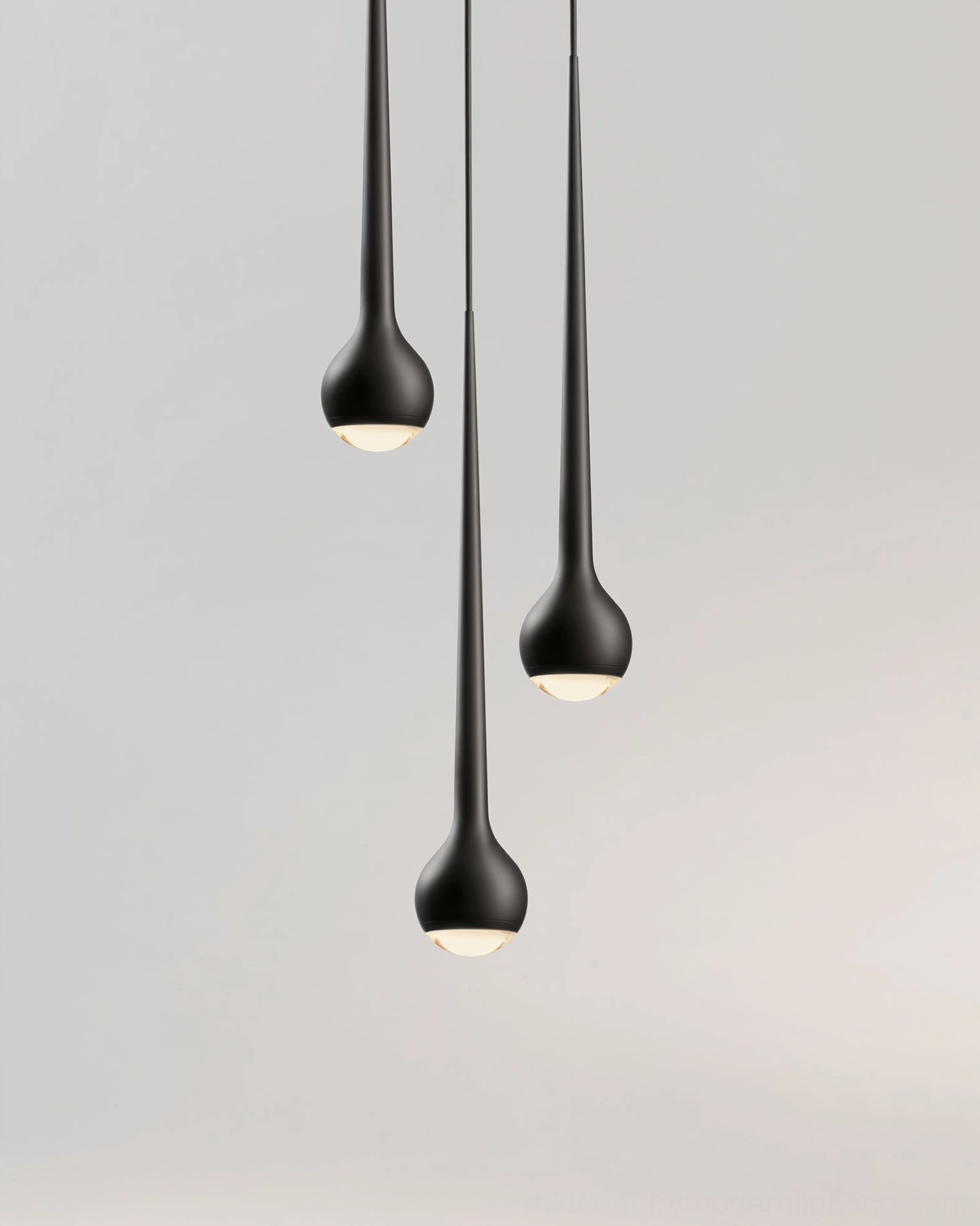 Chrome and metal teardrop pendant light showing reflective surface detail