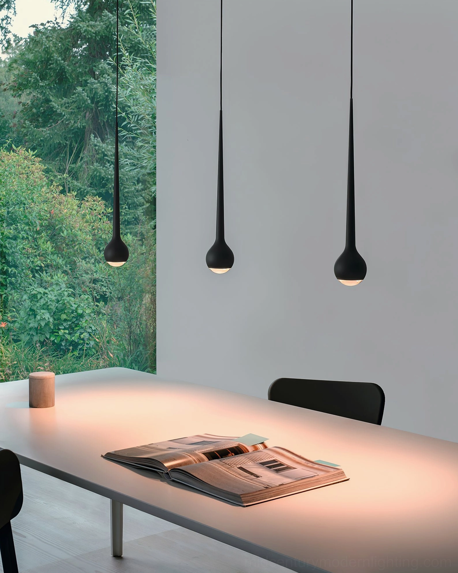 Teardrop pendant light with warm color temperature in residential kitchen counter area