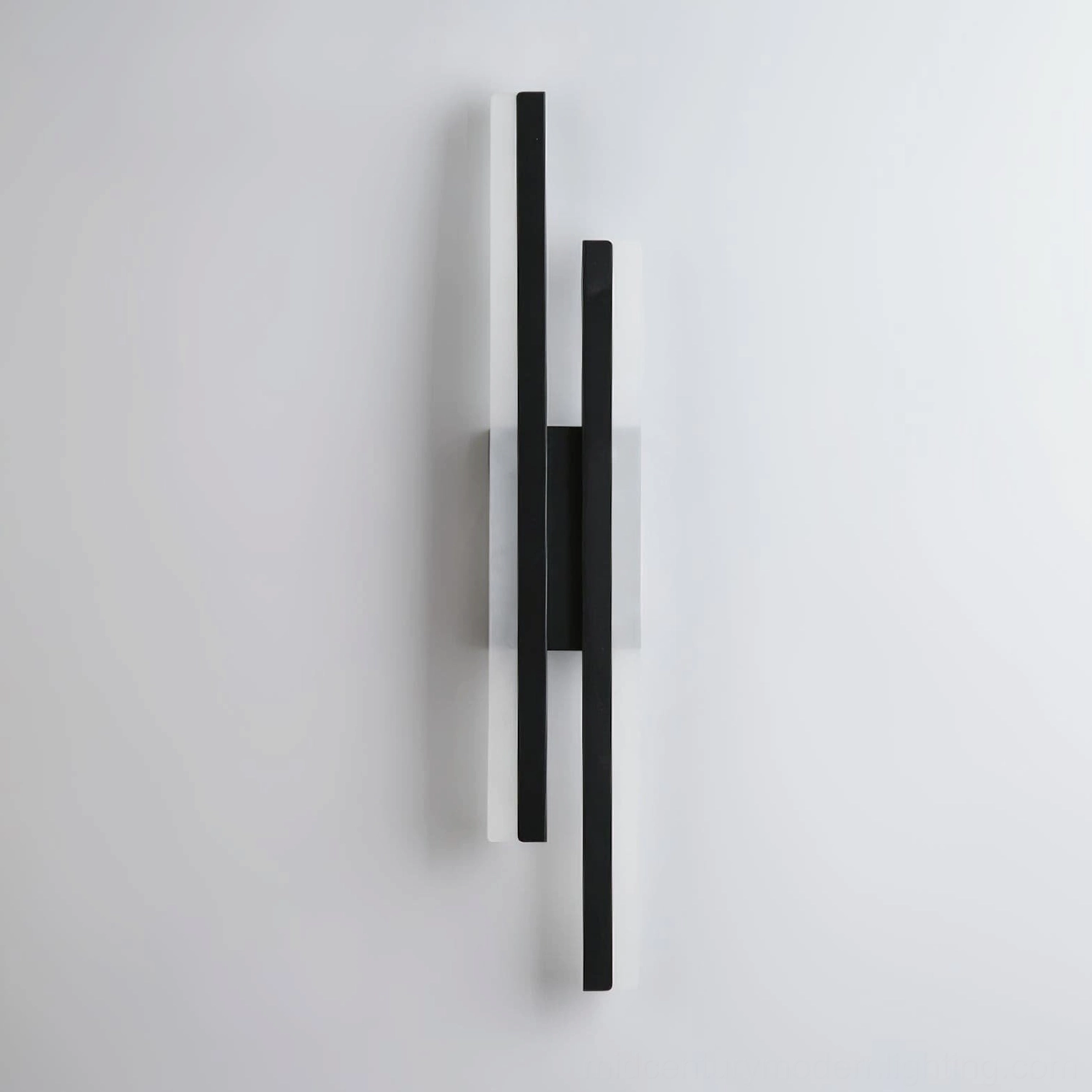 Black Fallon minimalist dual-tube wall sconce frontal view on white background showing vertical design