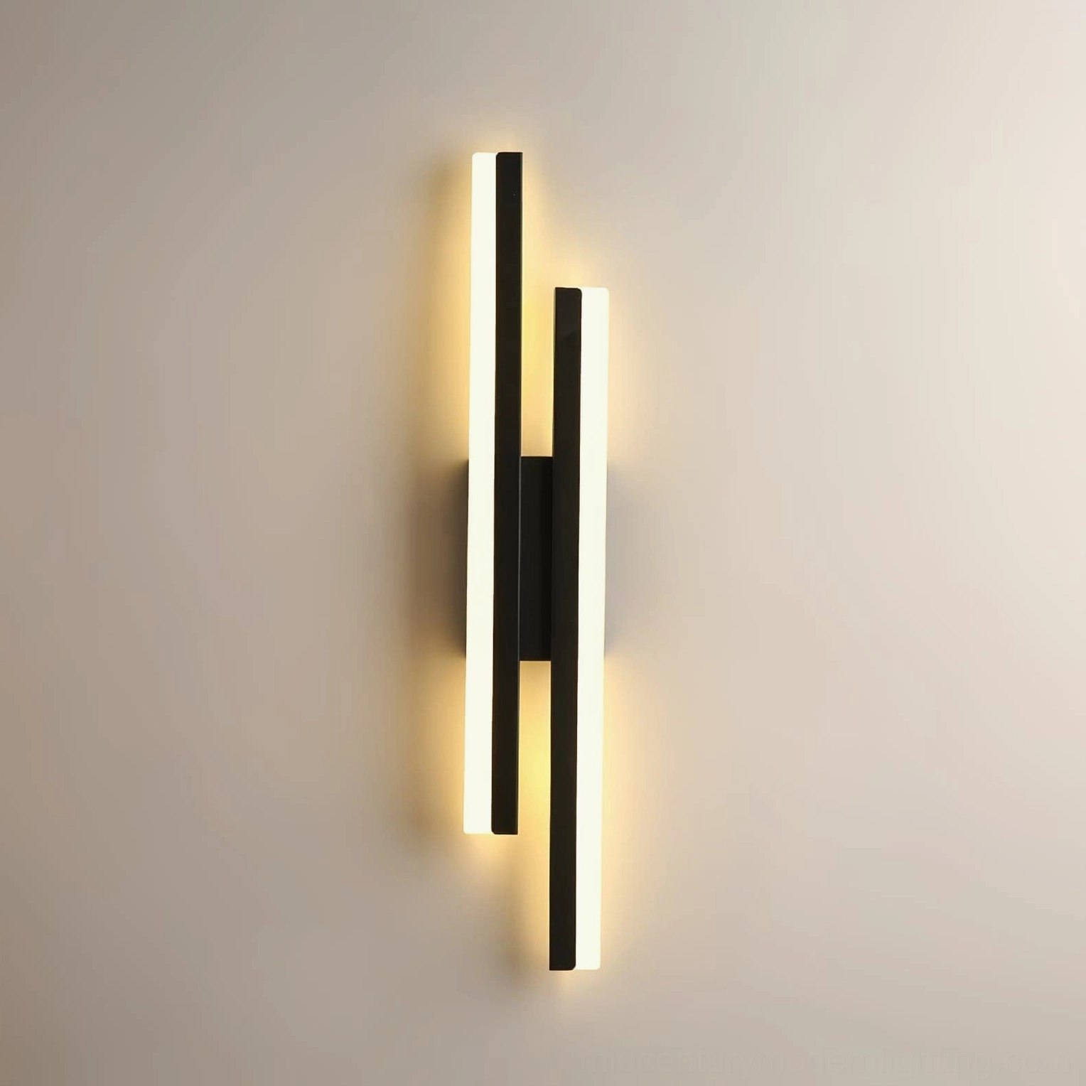 Black Fallon wall sconce with integrated LED in warm and cool light options for modern homes