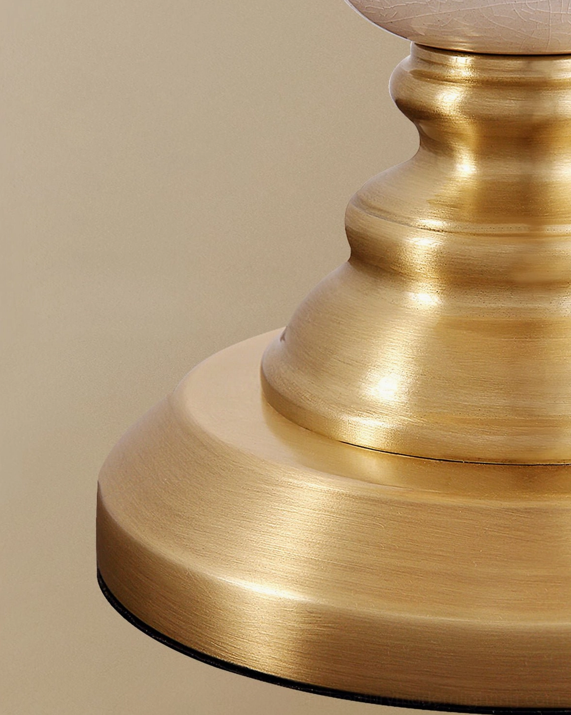 Table lamp shade detail with scalloped edge design typical of mid-century aesthetic