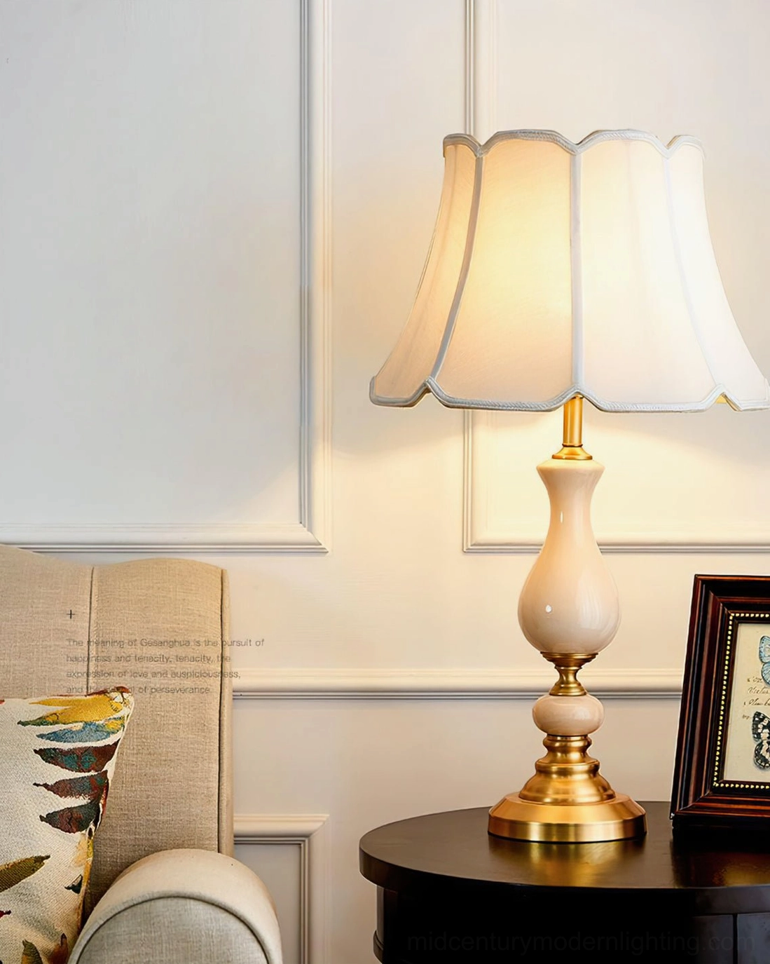 Mid-century modern lamp in home study desk area with books, framed art and antler decor