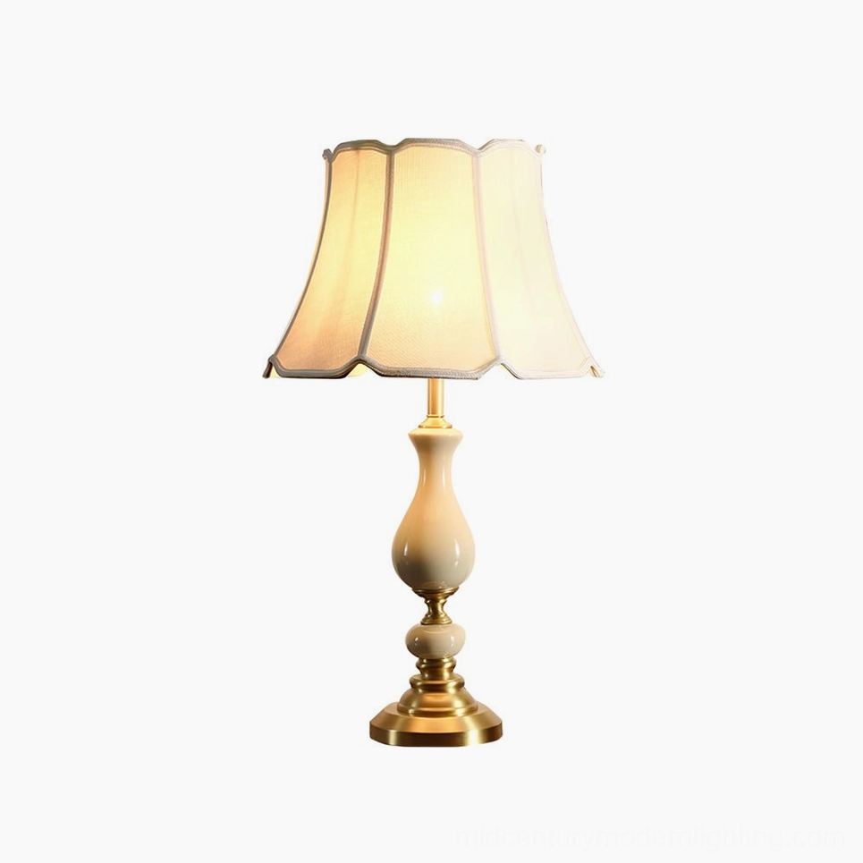 Fangio mid-century modern ceramic table lamp with warm brass accents and ivory linen shade