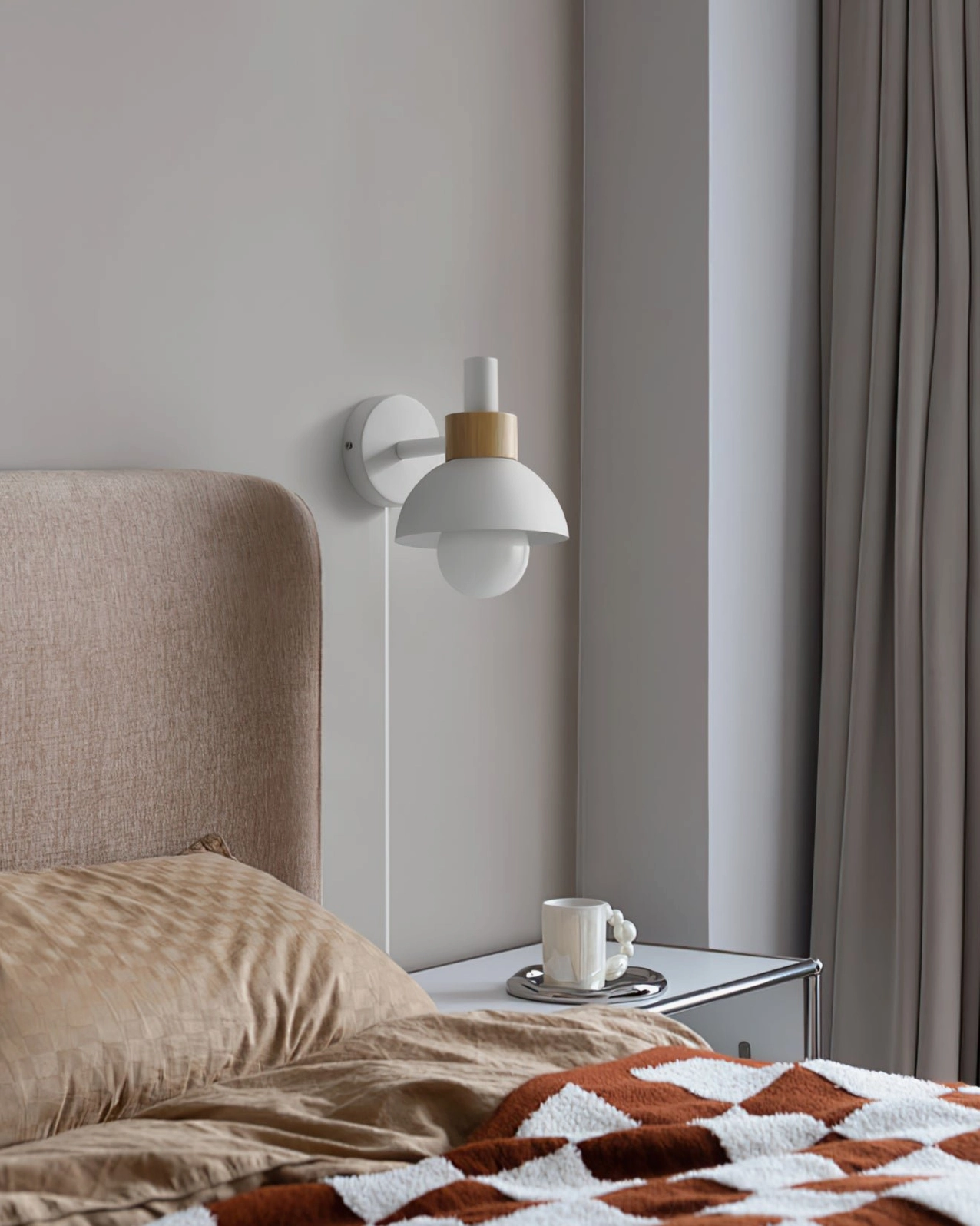 Fanta white plug-in wall lamp mounted in cozy beige bedroom as bedside lighting
