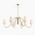 Farlane 6-light brass chandelier front view with white fabric shades, minimalist modern design, studio photography
