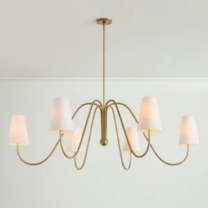 Curved brass arms of Farlane chandelier showing sculptural metalwork and tapered fabric shade detail