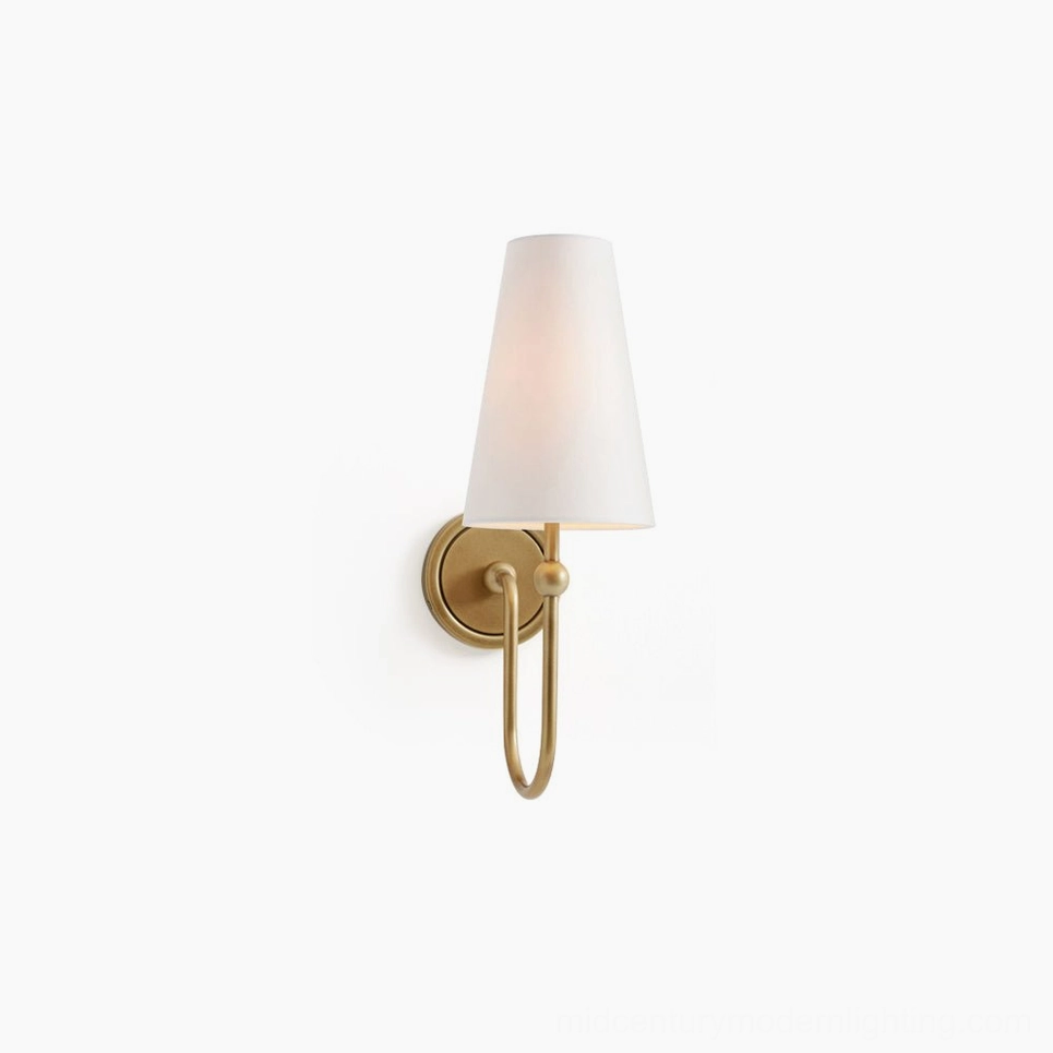 Farlane brass wall sconce front view with tapered white fabric shade and minimalist design