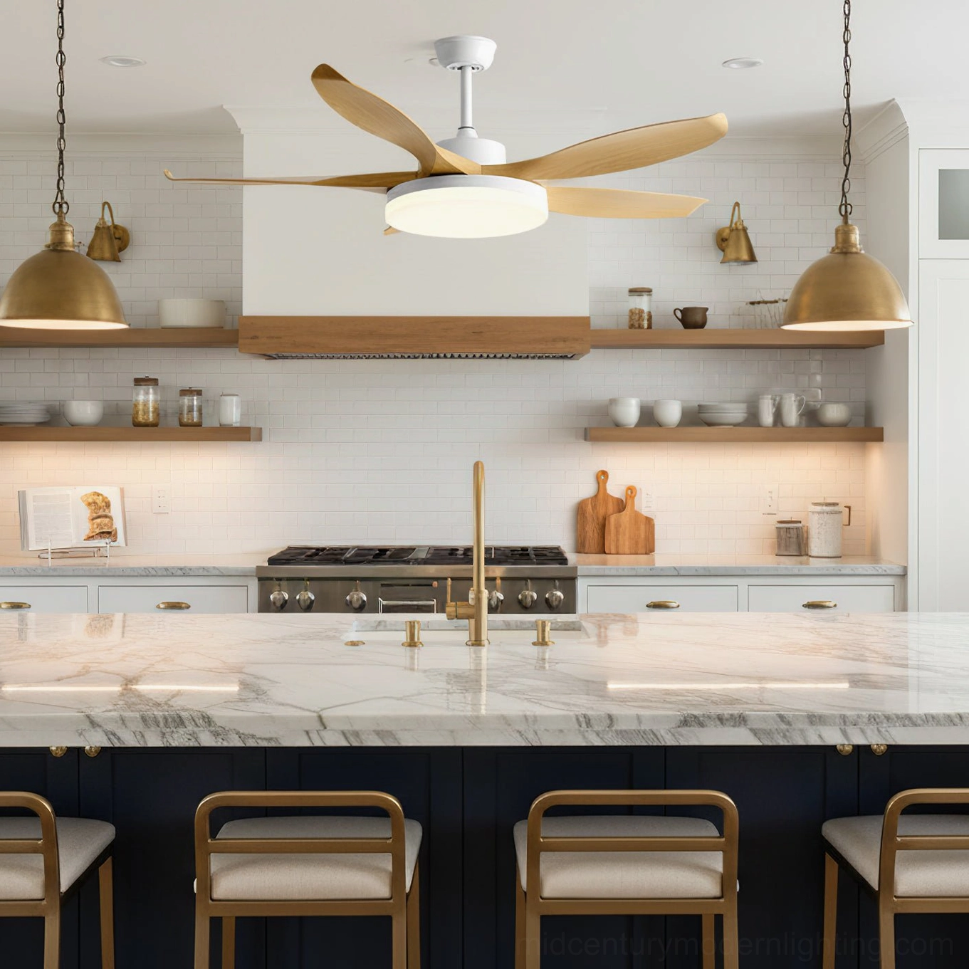 Light wood grain ceiling fan light installed in modern farmhouse kitchen paired with brass pendant lighting fixtures
