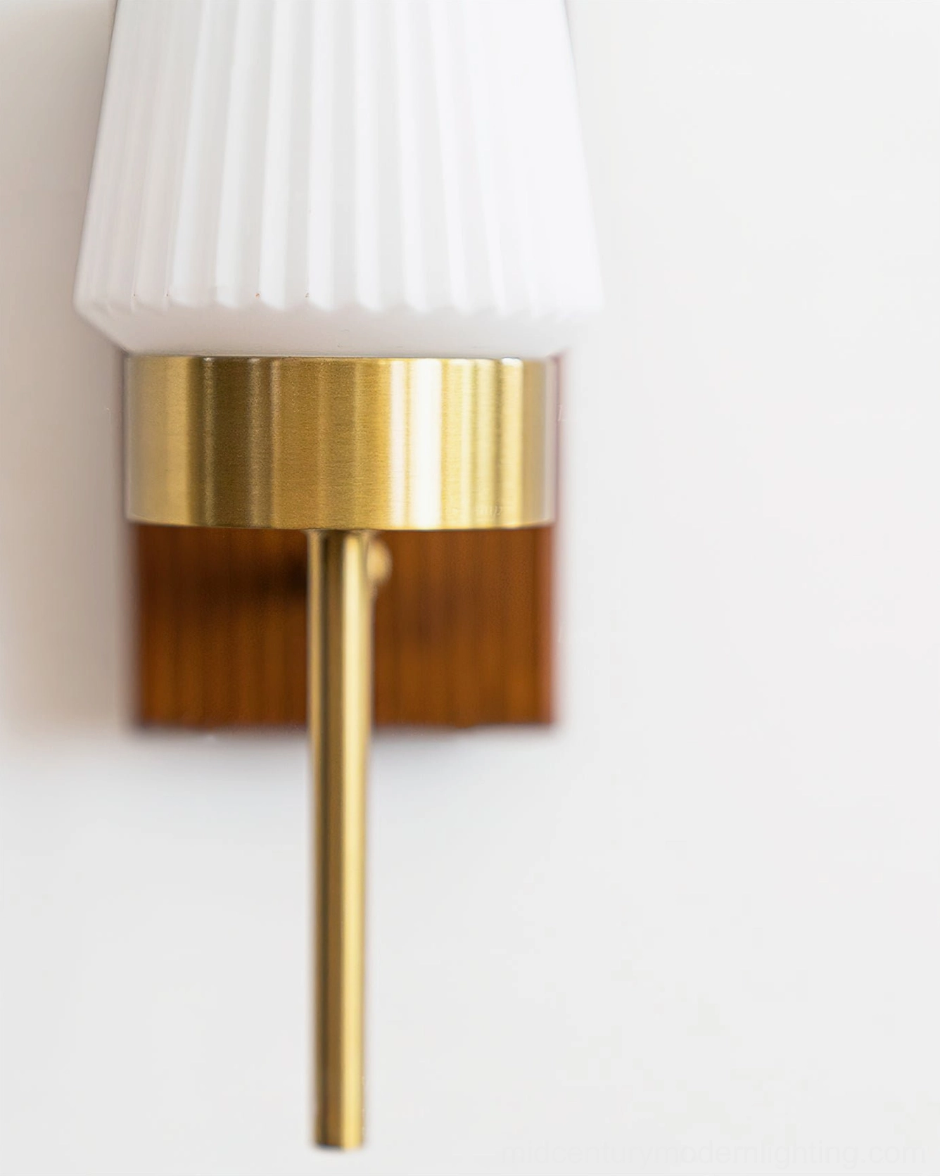 Farrell wall sconce variation view showcasing full design with polished brass finish and ribbed glass diffuser