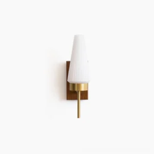 Farrell mid-century wall sconce with white ribbed glass shade and walnut wood backplate, frontal view on white wall
