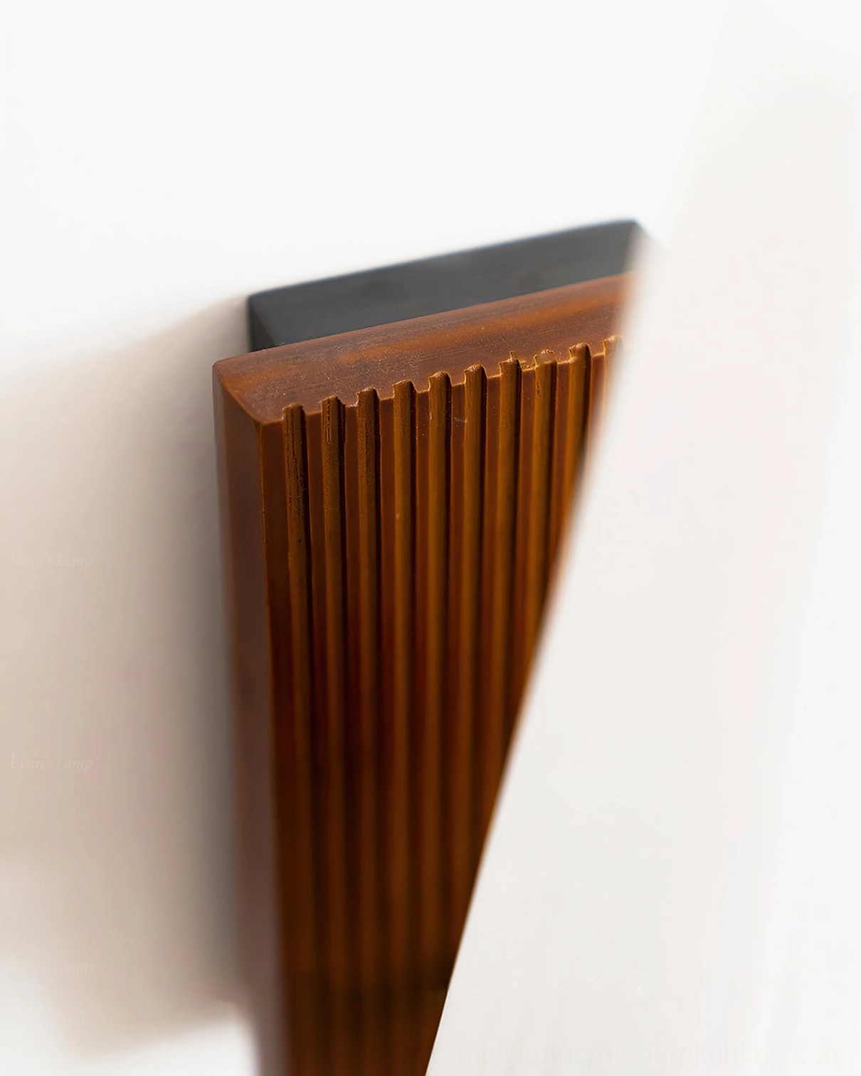 Farrell sconce ribbed wooden mounting plate close-up detail shot showing craftsmanship and material texture