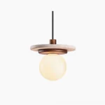 Farren travertine pendant light with stacked disk design, frosted glass globe, and walnut wood accent on white background