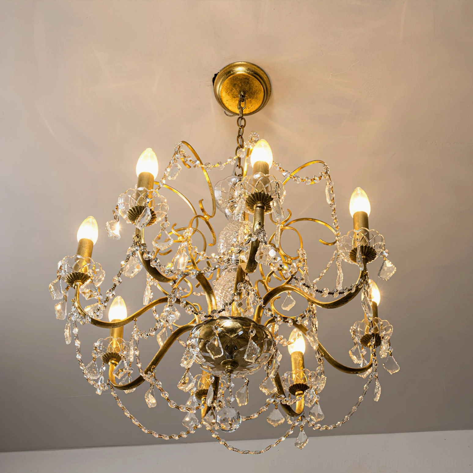 Fauna crystal chandelier with adjustable chain showing installation height flexibility and ceiling mounting hardware configuration