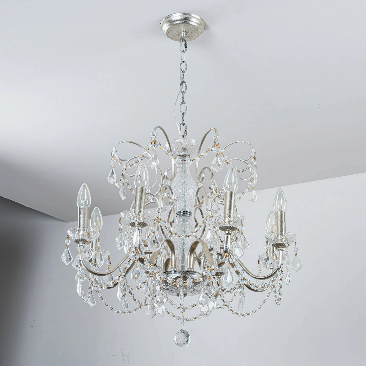 Fauna crystal chandelier side profile showing metal frame construction and crystal element arrangement in modern lighting design
