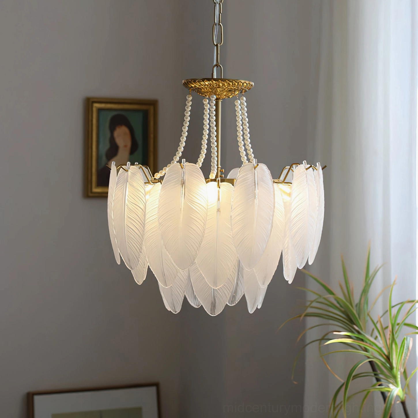 Upper view of feathered glass chandelier showing ceiling mount, brass hardware, and layered glass feather construction design