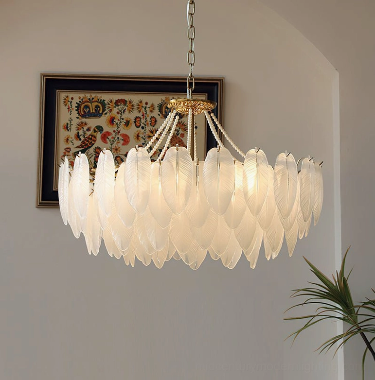 Large 31.5-inch feathered glass chandelier in grand foyer or open-concept kitchen making dramatic statement with scale and presence